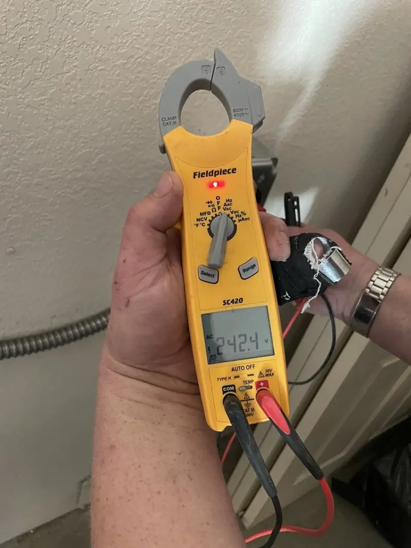 Voltage testing with clamp meter during Hot Tub / Pool Electrical Wiring in Aledo